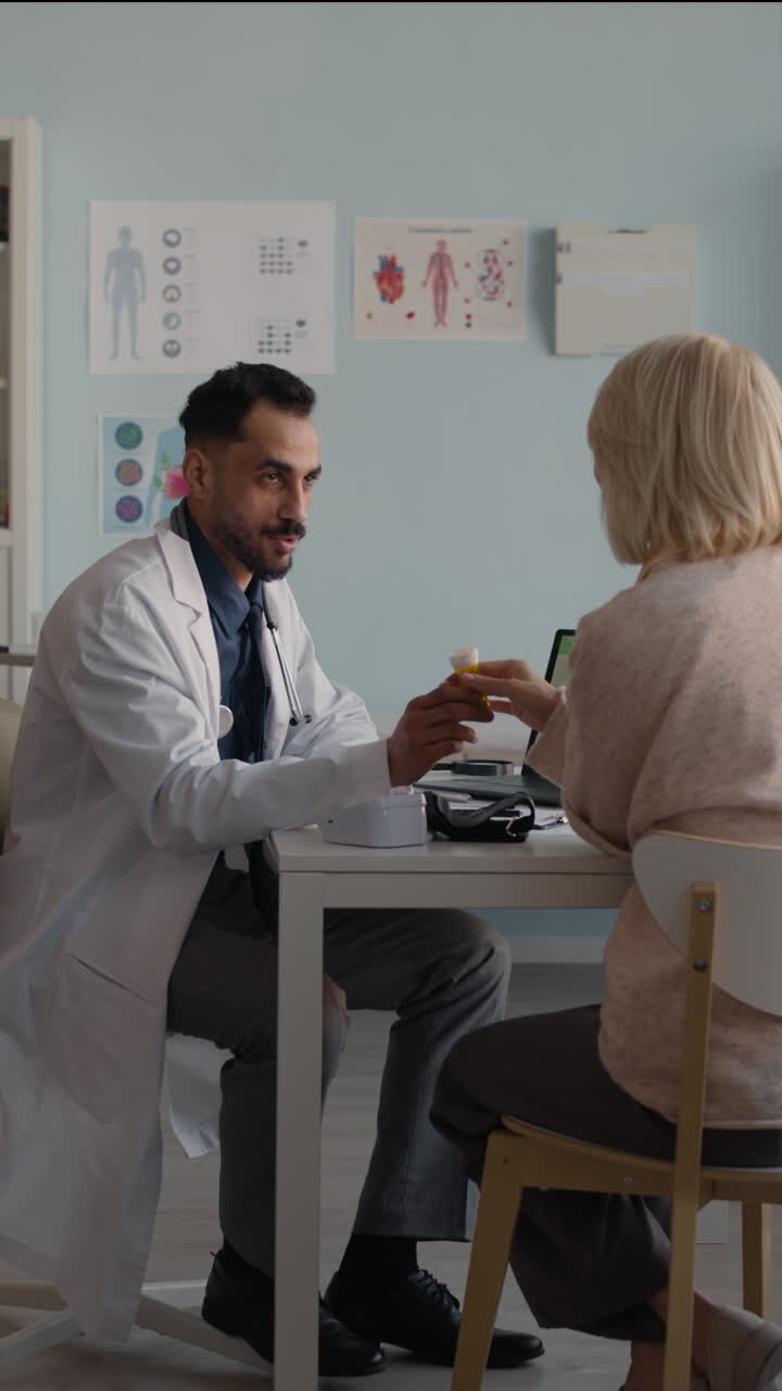 Doctor consulting with patient about medication