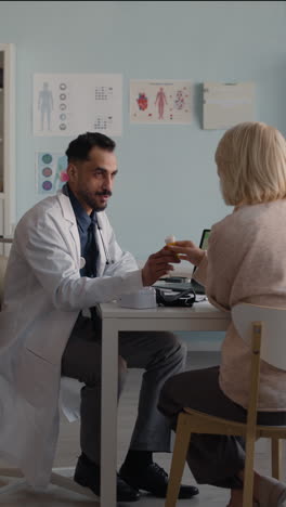 doctor consulting with patient about medication