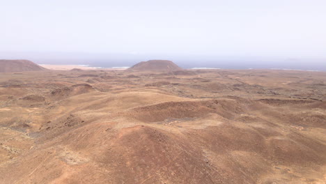 vista of arid slope mountains in remote area deserts at fuerteventura, canary islands, spain