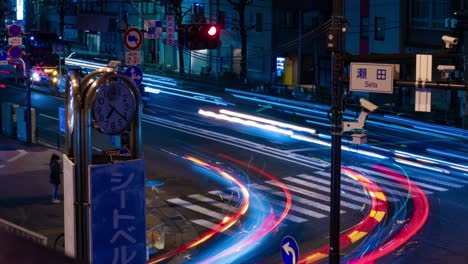 a night timelapse of the traffic jam at the city street in tokyo