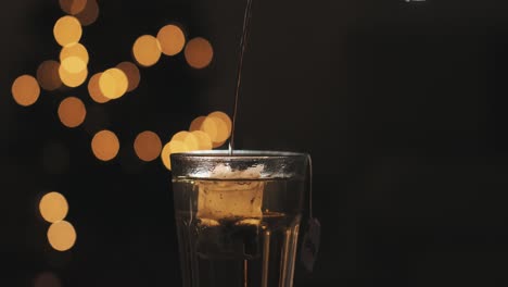 pouring hot water on a cristal glass