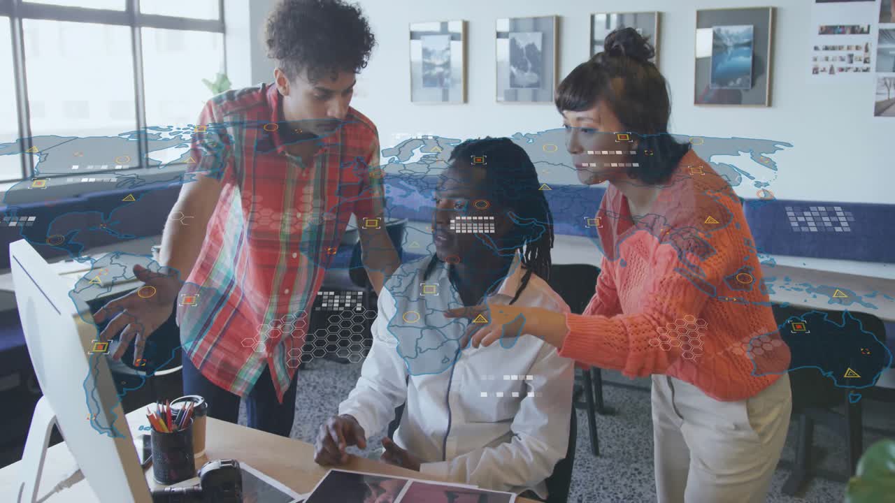 Design team shifting focus from prints to glowing data graphics after pointing, calibrating colors