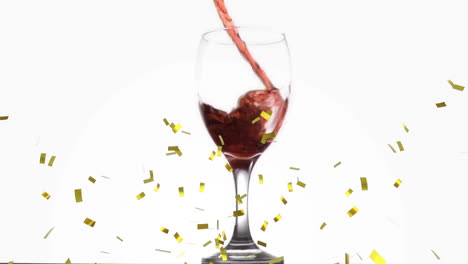 animation of confetti over glass of red wine on white background
