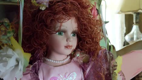 antique girl dolls sitting and staring, red head, blonde, creepy