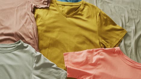 Video-of-close-up-of-multiple-layered-t-shirts