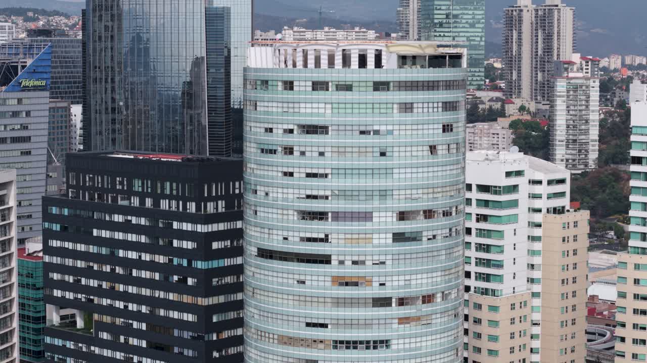 Aerial panoramic view with telephoto lens, close-up of Santa Fe, CDMX skyline