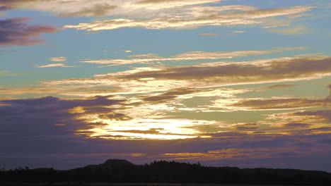 4k majestic footage of sunset landscape amazing light of nature cloudscape sky and clouds moving away rolling 4k colorful dark sunset clouds