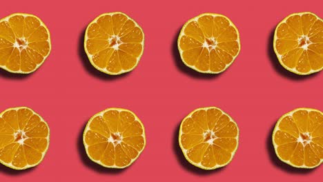 coral background with mandarin pattern in geometric grid. minimal motion graphics natural fruit looped animation
