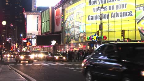 The-Streets-Are-Full-Of-People-After-Dark-In-This-Downtown-Shot-Of-New-York