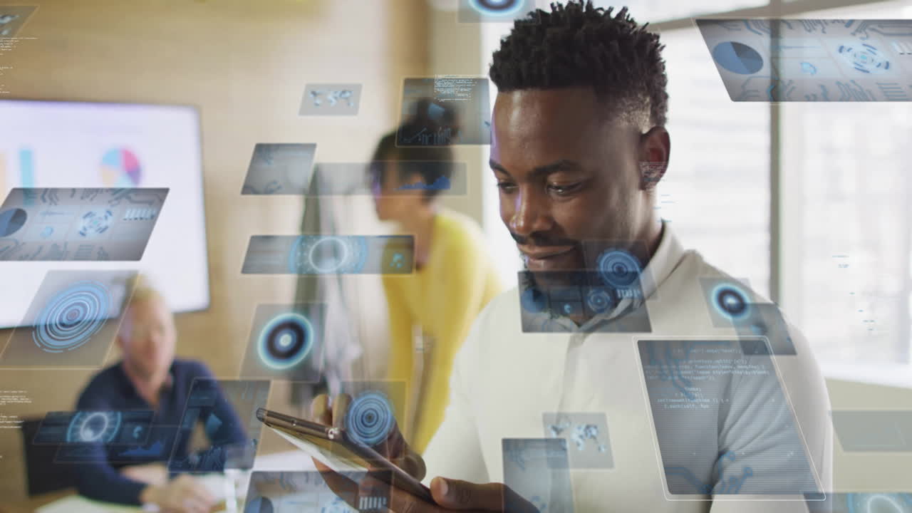 Animation of digital screens with data over diverse colleagues talking and using tablet in office