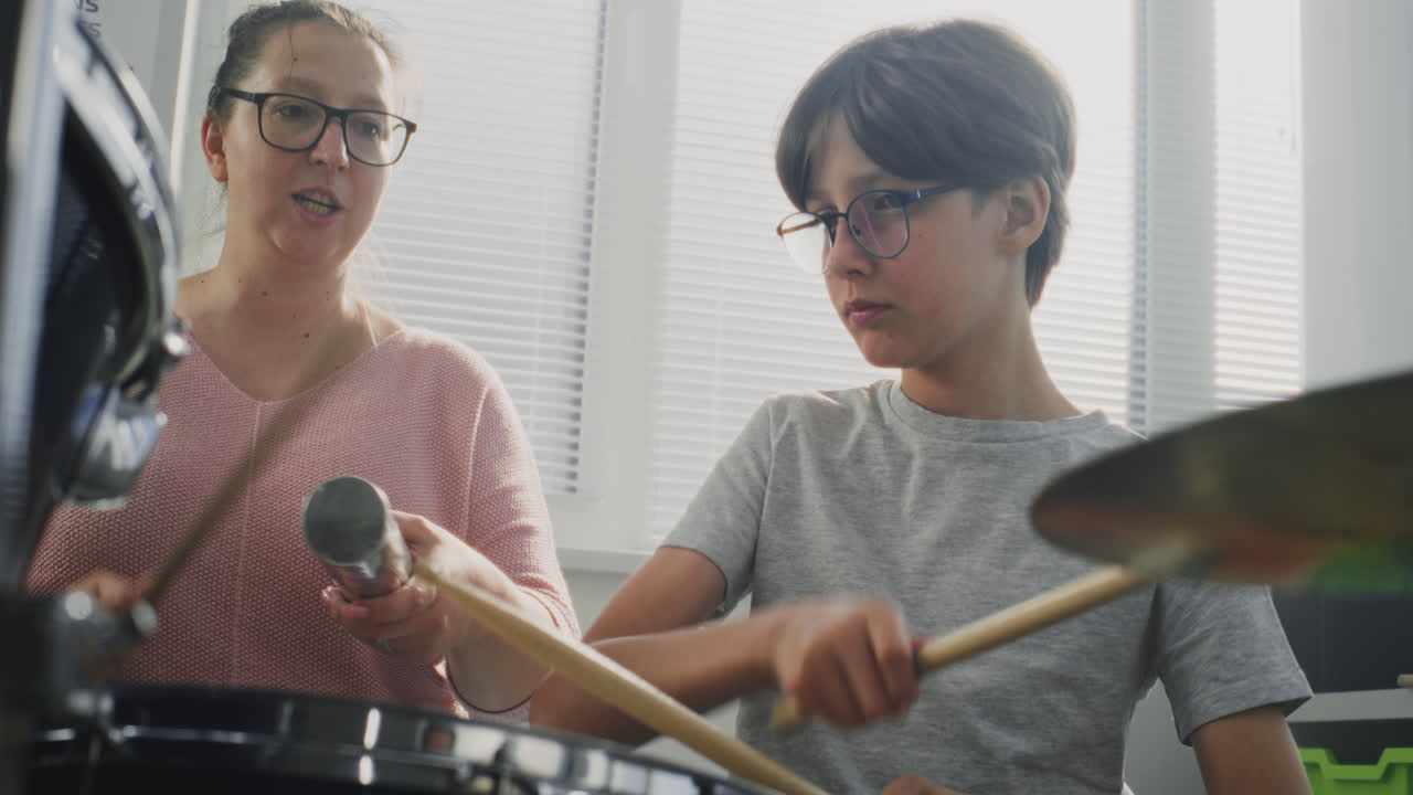 Talented Boy Playing Drums During Percussion Class Teacher Teaching Young Musician to Play Drum Kit