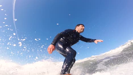 professional surfer doing a strong snap on the end