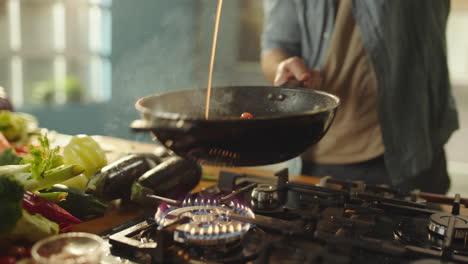 cooking vegetables in a wok
