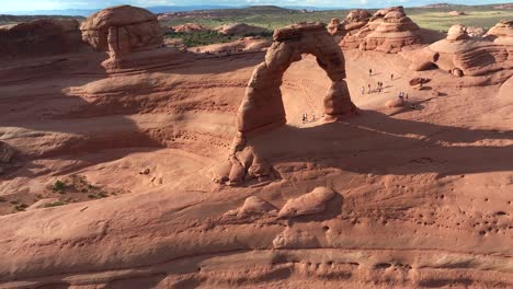 4k aerial of delicate arch in arches national park, utah, usa