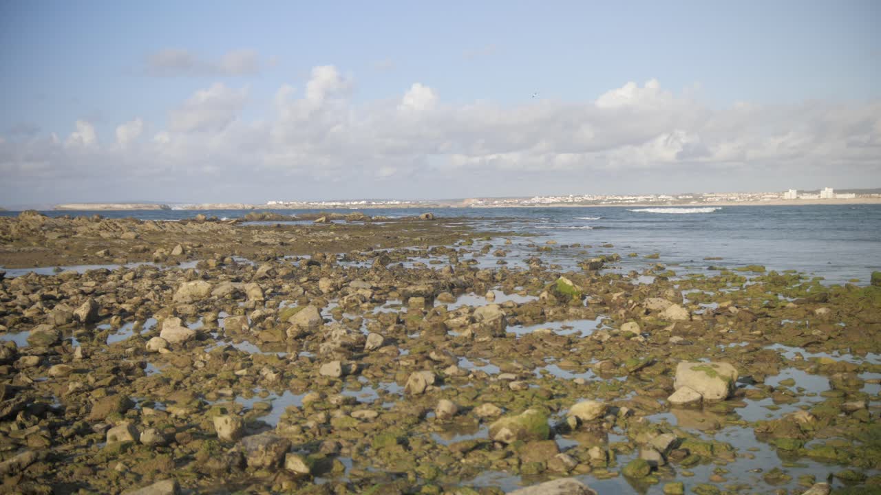 Sea with stones in the foreground in Peniche Porutgal