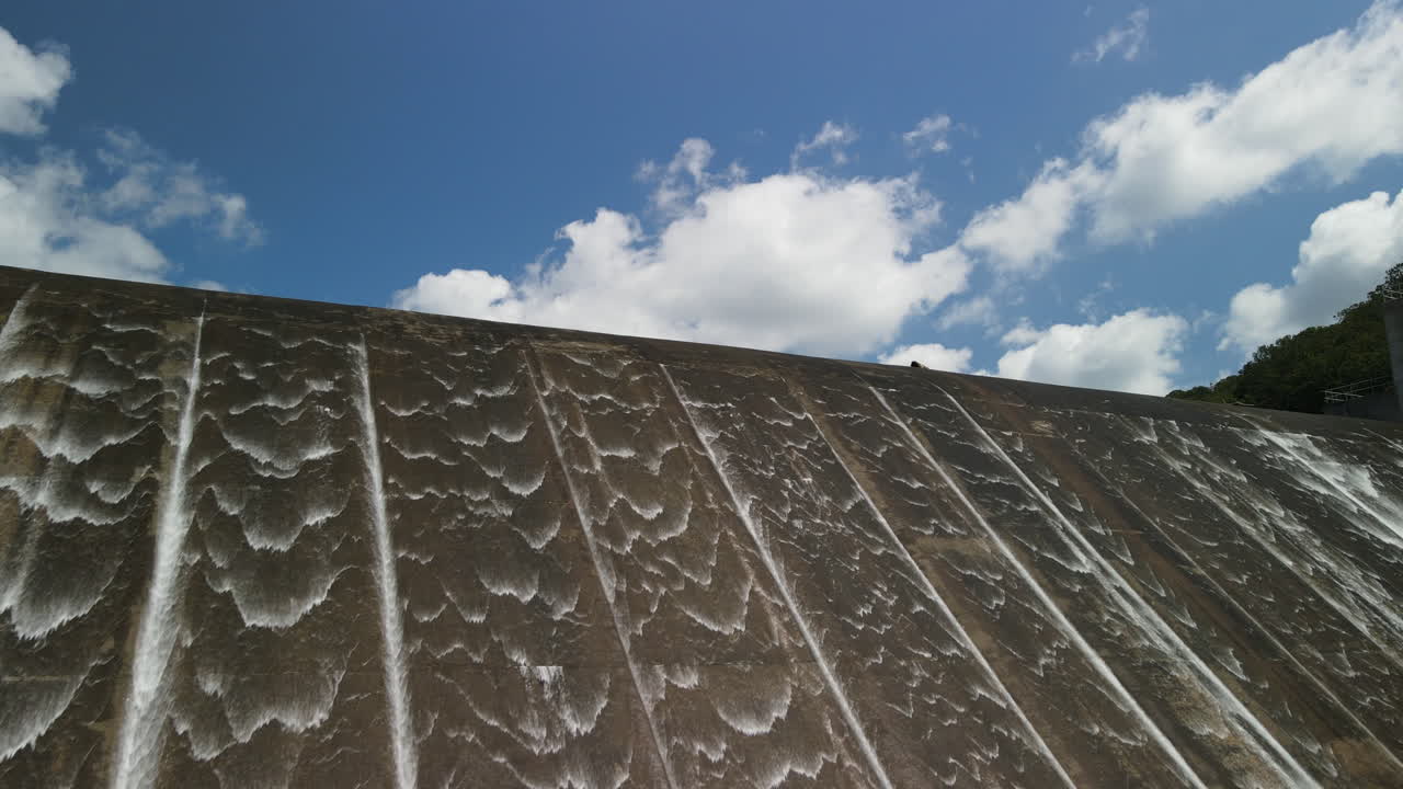 Water falling down hydroelectric dam