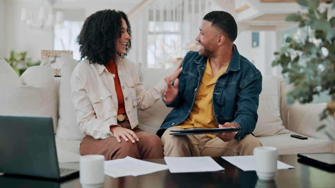 Couple Celebrating Success at Home