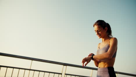 A-young-happy-girl-in-a-sports-summer-uniform-ran-to-the-finish-line-during-her-morning-run.-Overcoming-moral-obstacles-motivation