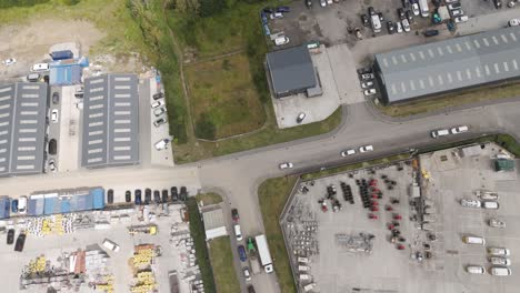 aerial view of industrial area with warehouses and parking lots
