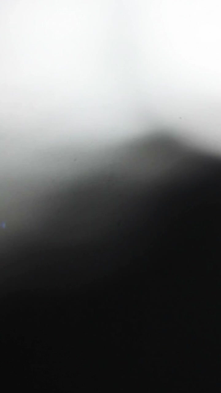 Abstract Light Flare Transition on Dark Background
