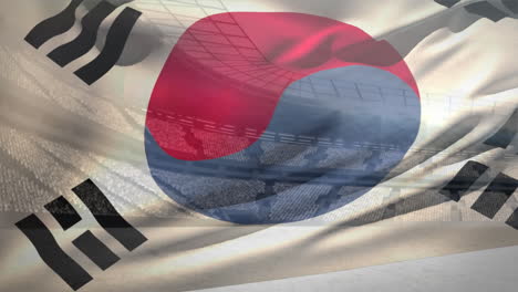 bandera coreana ondeando frente al estadio