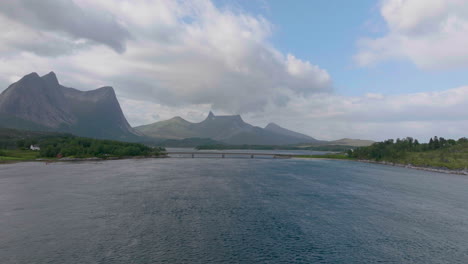 Scenic-View-Of-Norwegian-Fjord-And-Stortinden-Mountain-In-Norway---aerial-drone-shot