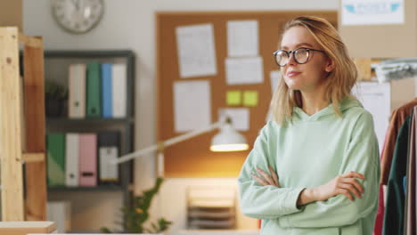 woman in office/fashion design studio