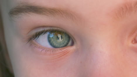 close up of a child with two different eye colors