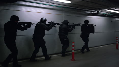 Soldiers-storming-building.-Special-assault-team-aiming-targets-on-firearms