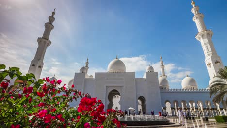 abu dhabi sunny day bright flowers grand mosque front entrance panorama 4k time lapse uae