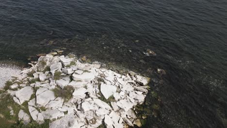 rocky coast by the sea with many waves