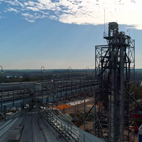 modern industrial plant on nature background. metal construction of agricultural factory. exterior of large manufacture. aerial view.