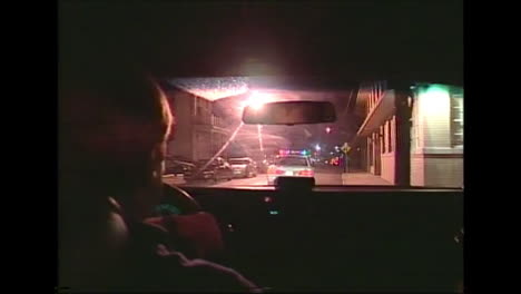 1980s pov night footage of police heading towards a crime in new orleans louisiana