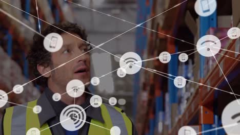 Animation-of-network-of-connections-over-caucasian-warehouse-worker
