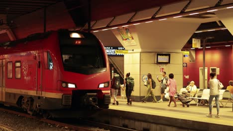 people boarding a train at turin station