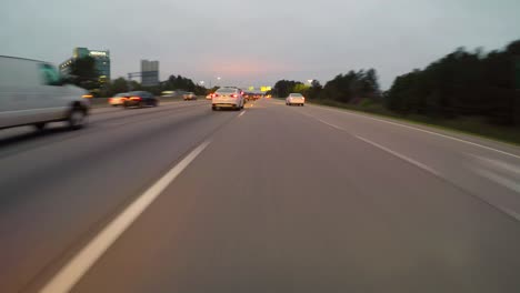 night time lapse with cars and light trails on highways and roads