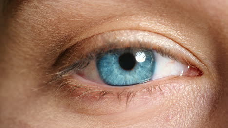 blue eye, eyesight and vision of woman blinking