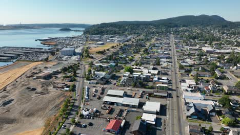 Drone-view-of-Anacortes,-WA-with-water-off-in-the-distance