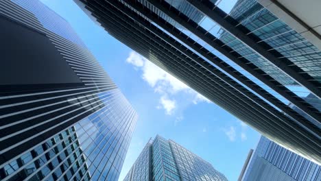 Skyscrapers-rise-against-a-bright-blue-sky-in-a-cityscape-view