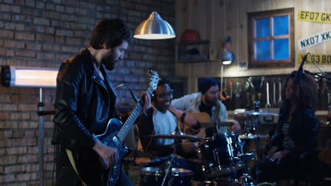 band rehearsing in a recording studio