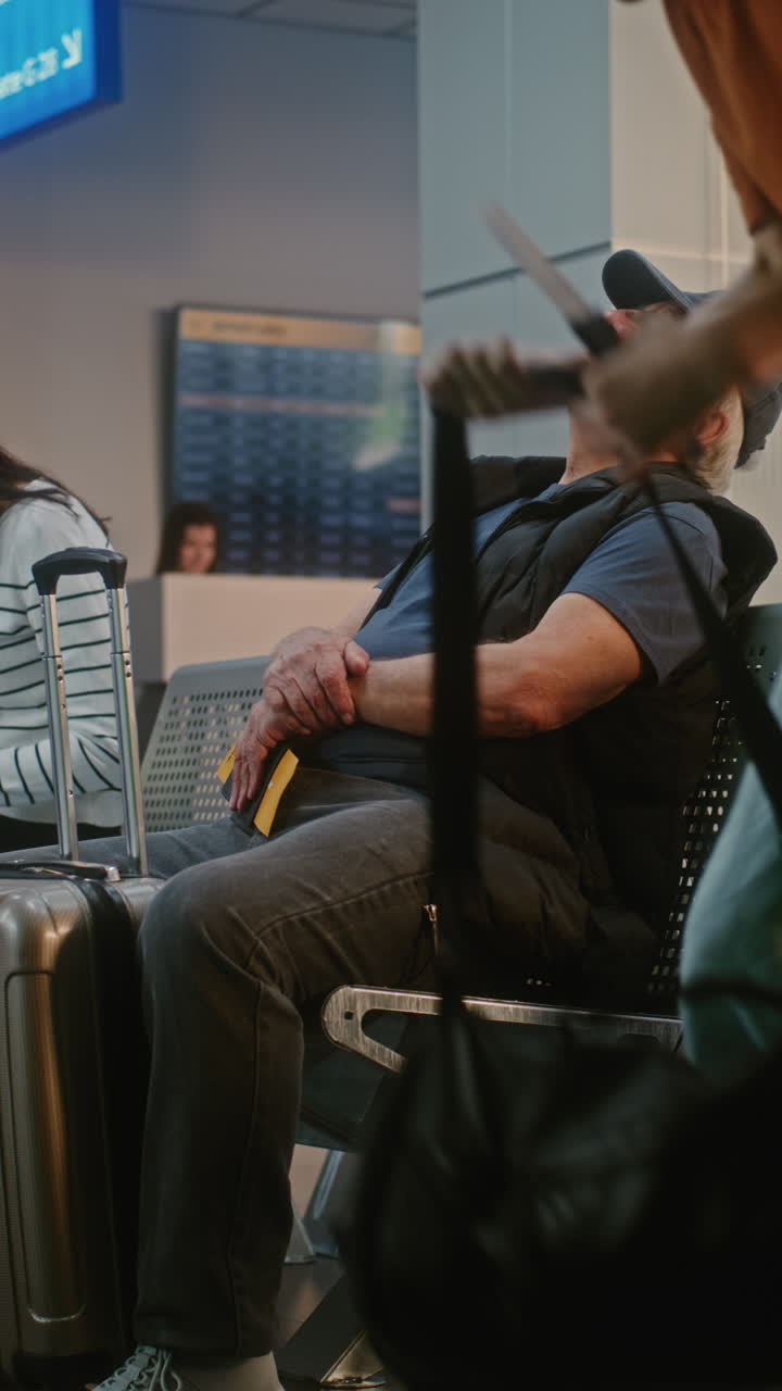Senior Man Sleeping in Airport