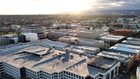 Aerial-rising-over-Sony-Pictures-in-Culver-City-at-sunset-with-famous-water-tower