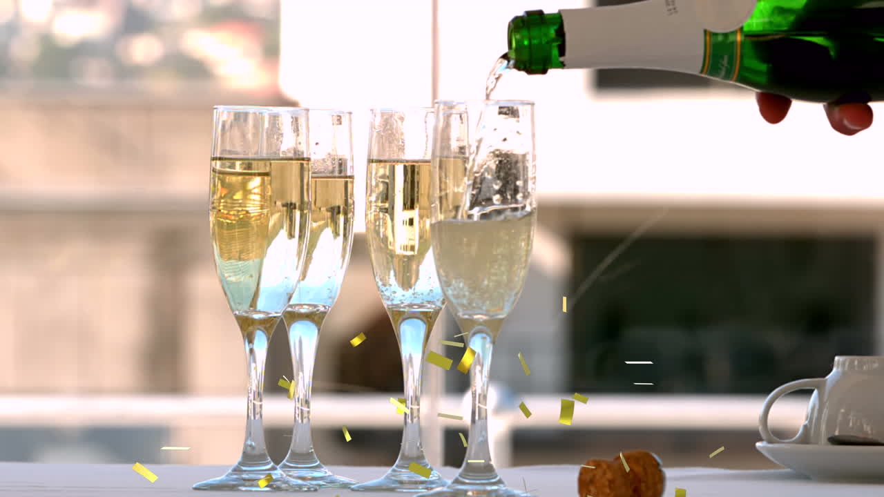 Animazione di coriandoli che cadono e champagne che viene versato nei flûte