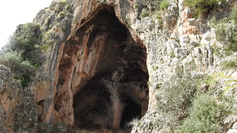 view at the natural cave entrance at the mountain taza region , morocco