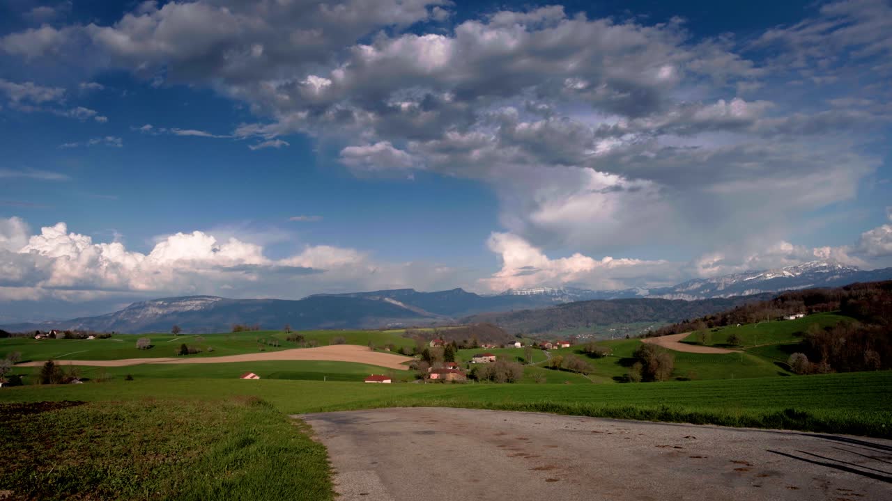 Panoramic view of a green meadow landscape in the foothills of the Chartreuse massif, Is&egrave;re, Velanne in Auvergne-Rh&ocirc;ne-Alpes - France