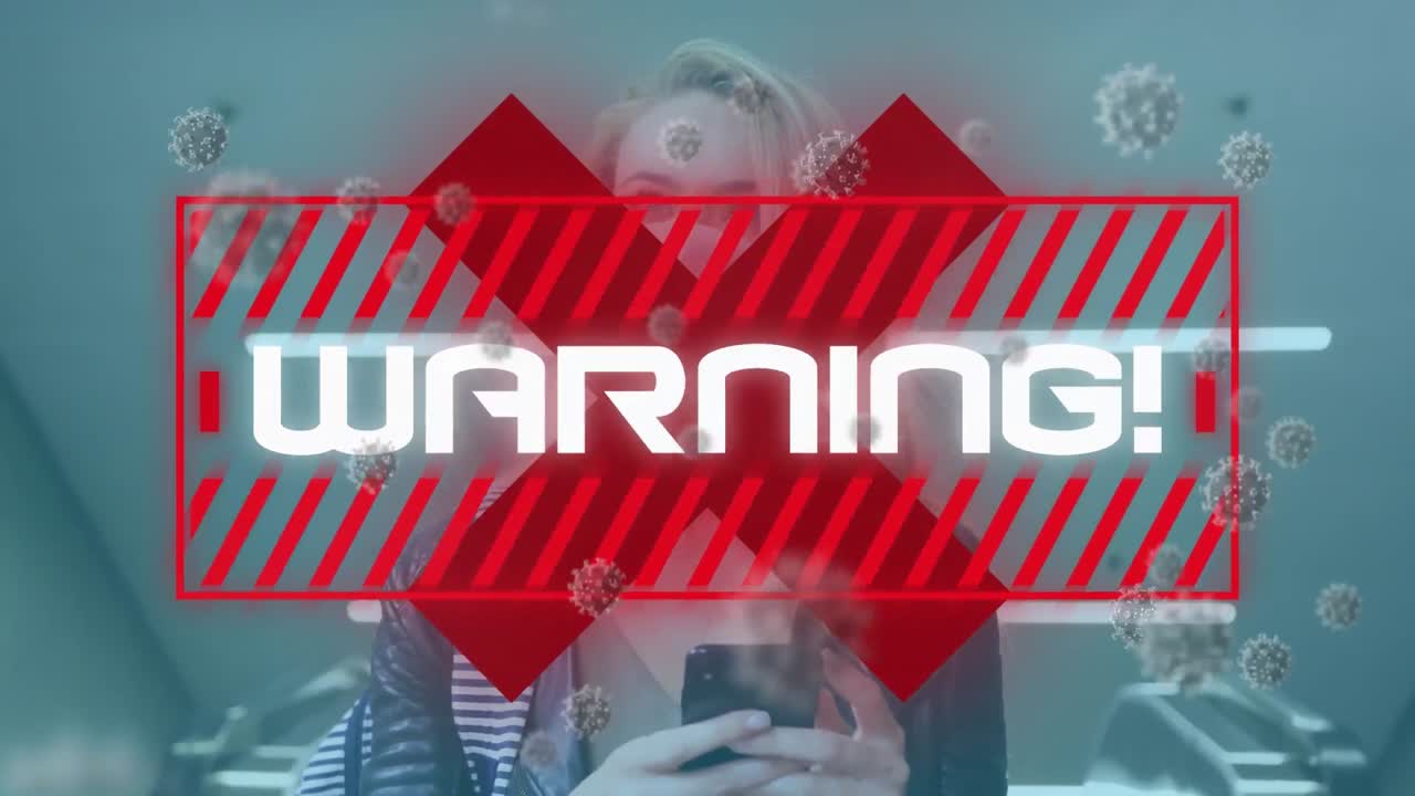 animación de texto de advertencia y células de virus sobre una mujer que usa una máscara facial