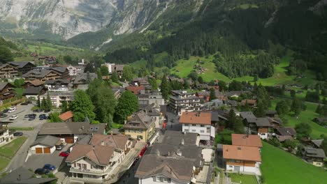 aerial reveal over the village of grindelwald in switzerland