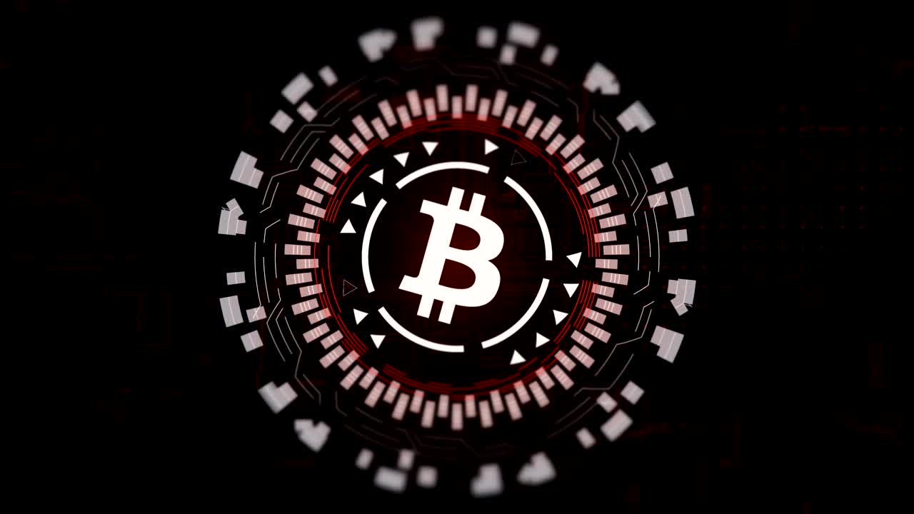 Red circular hologram rotating bitcoin sign in center