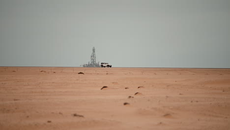 oil rig in the desert landscape