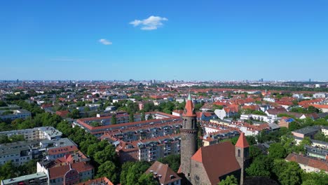 Magic-aerial-top-view-flight-Lukas-church-city-Berlin-steglitz,-Germany-Summer-day-2023
